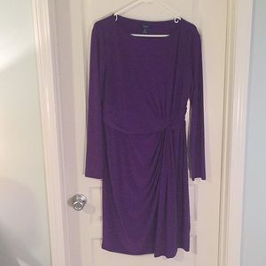 Purple long sleeved ruched dress.